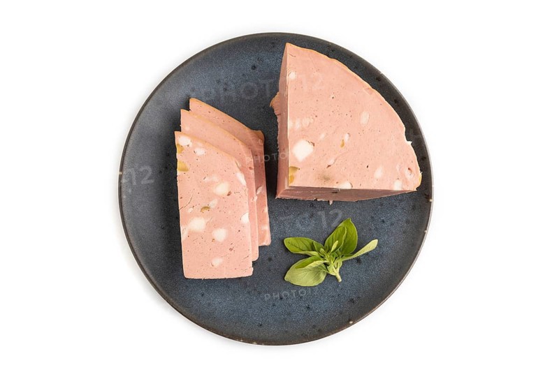Mortadella sausage on plate with pepper and herbs isolated on white background. Top view, flat lay, copy space