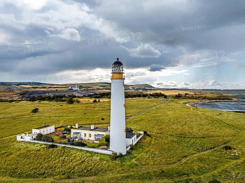 DefaultRain Clouds over Barns Ness Lighthouse from a drone, Dunbar, East Lothian, Scotland, UK