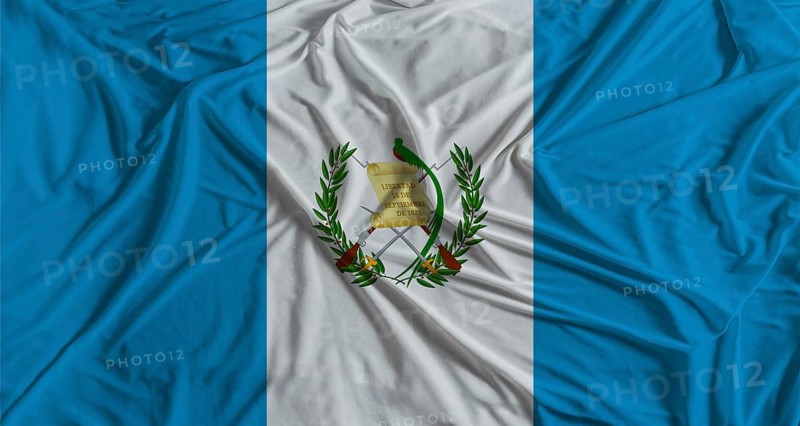Guatemalan flag with fabric texture background. National flag of Guatemala