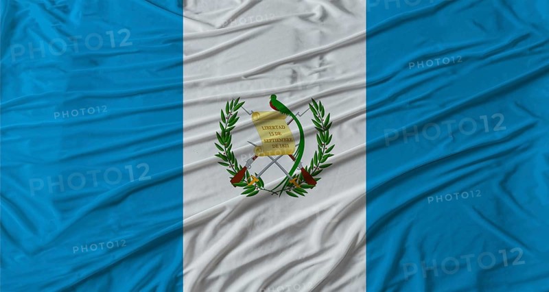 Guatemalan flag waving. Flag of Guatemala with cloth texture