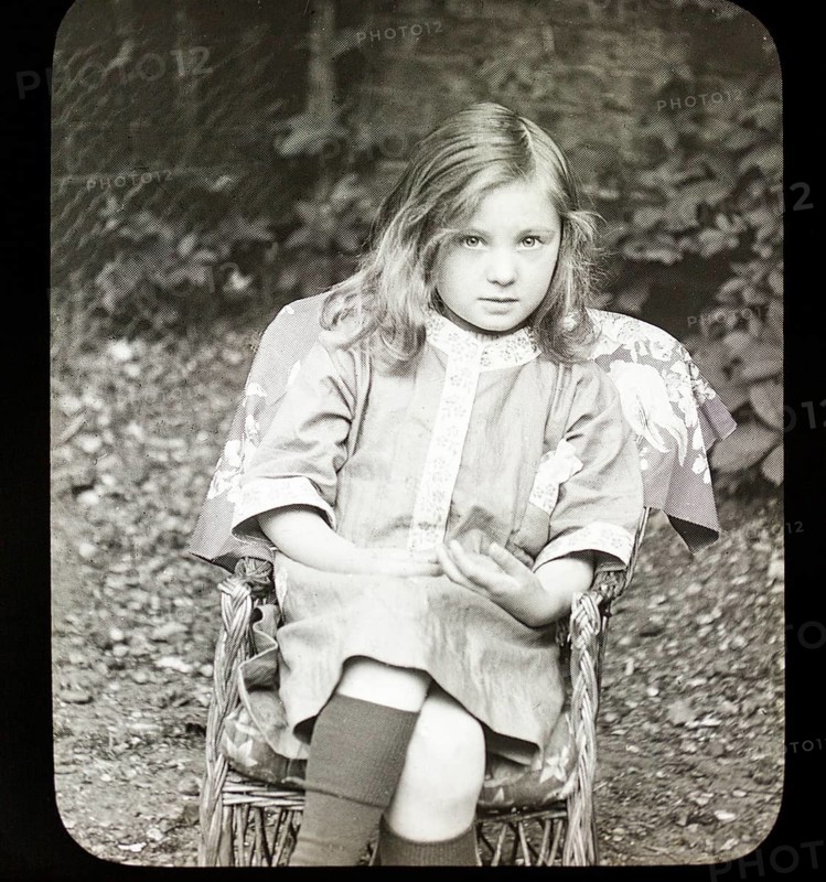 Magic lantern slide c 1900-1910 halftone portrait of pretty young girl sitting in a chair