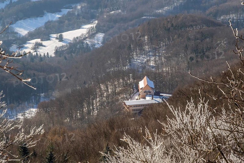 House standing in the middle of a forest in winter, Vápec, Horná Poruba, Slovakia