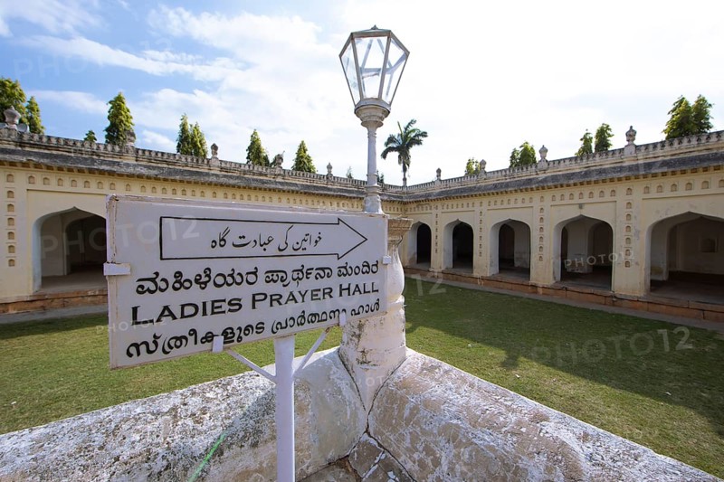 Signpost in the gumbaz or mausoleum of Tipu Sultan and his family, Srirangapatna, Karnataka, India