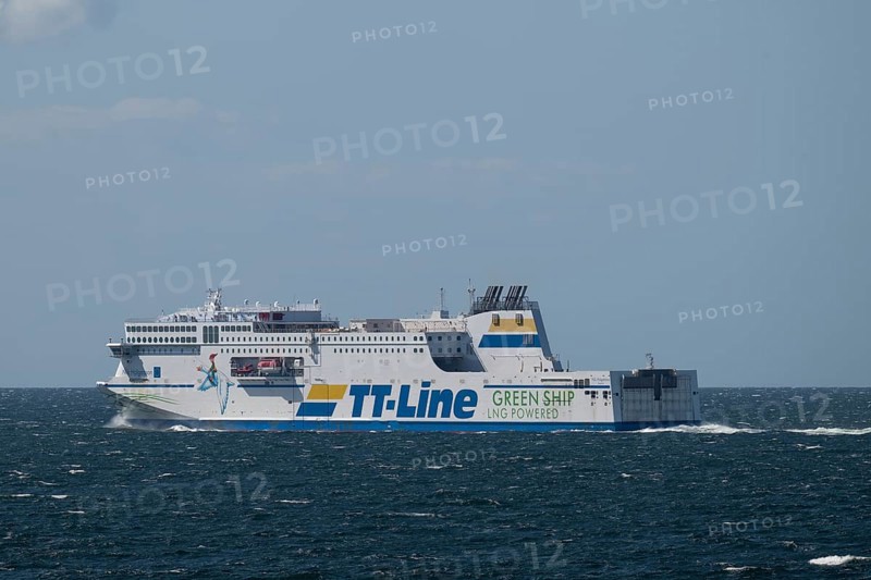 LNG-powered TT-Line ferry travelling across a gently moving blue sea, near Warnemünde, Rostock, Mecklenburg-Vorpommern, Germany