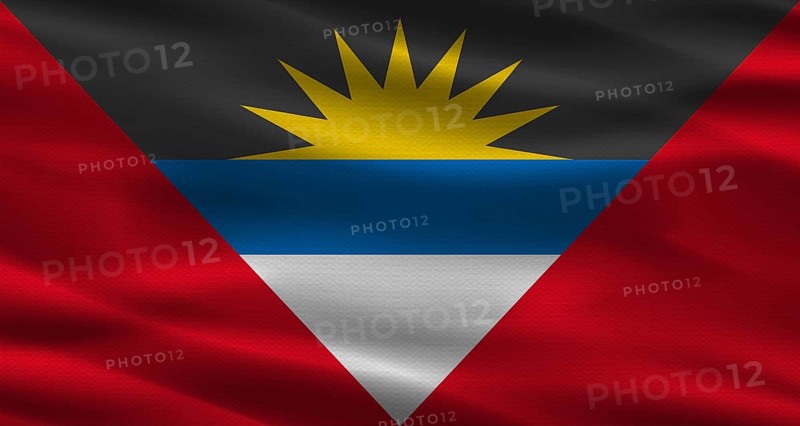 Antigua and Barbuda flag with fabric texture. Realistic flag of Antigua and Barbuda waving