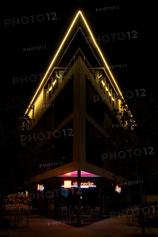 Night shot of a striking building in Hanover Herrenhausen, Hanover, Lower Saxony, Germany