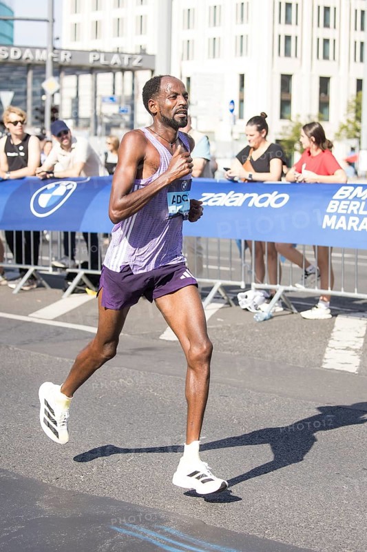 Guye Adola (ETH), later in 4th place, at KM38 in front of Potsdamer Platz at the 51st BMW Berlin Marathon 2025 on 21/09/2025