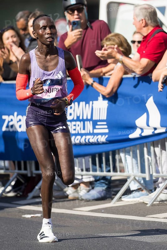Rosemary Wanjiru (KEN), later fastest woman, at KM38 in front of Potsdamer Platz at the 51st BMW Berlin Marathon 2025 on 21/09/2025