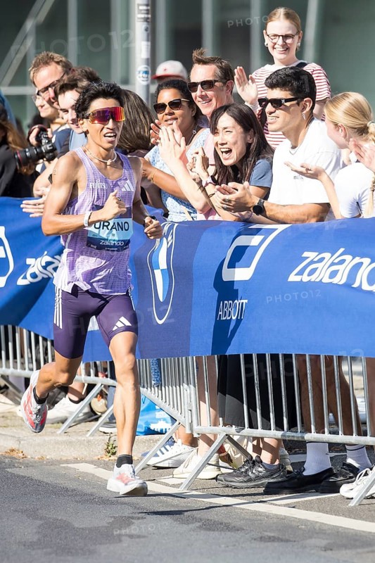 Yuhei Urano (JPN), later in 5th place, at KM38 in front of Potsdamer Platz at the 51st BMW Berlin Marathon 2025 on 21/09/2025