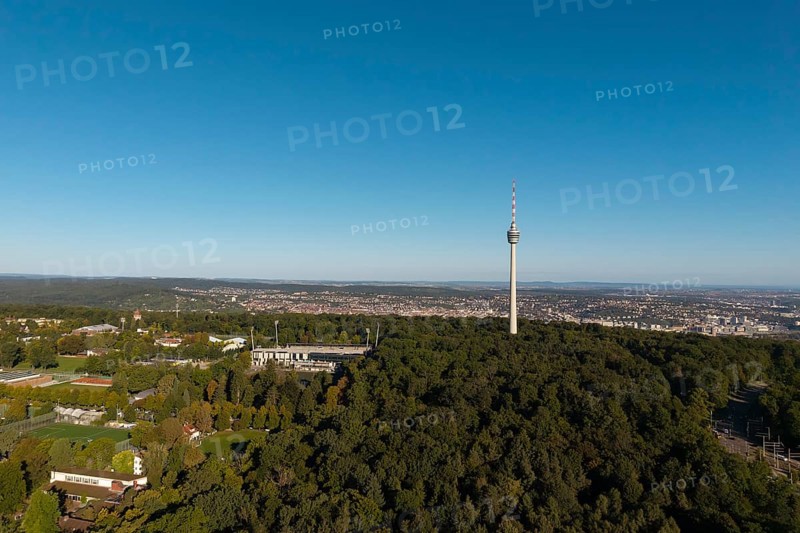 Impressive view over a green forest landscape with a striking television tower and a city in the background, Gazi Stadium, Stuttgart, Baden-Württemberg, Germany