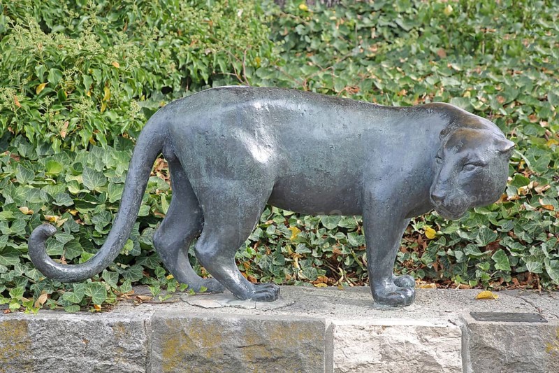 Sculpture Jaguar by Heinrich Drake 1938, grey, black, panther, bronze sculpture, life-size, modern art, animal figure, sculpture park, Magdeburg, Saxony-Anhalt, Germany