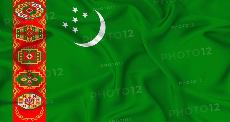Realistic Turkmenistan flag waving. Close up of flag of Turkmenistan with cloth texture