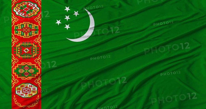 Turkmen flag waving. Flag of Turkmenistan with cloth texture