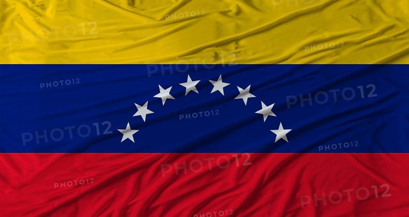 Venezuelan flag waving. Flag of Venezuela with cloth texture