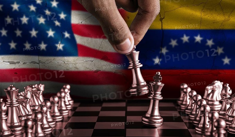 Political tension between Venezuela and USA. Venezuela vs USA flag on chessboard