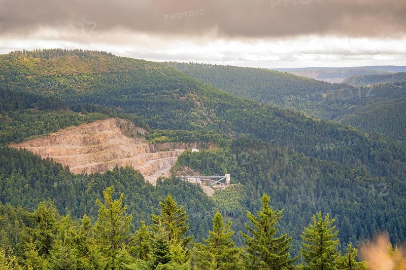 Quarry in the middle of forests under a cloudy sky, Black Forest, Seebach, Germany