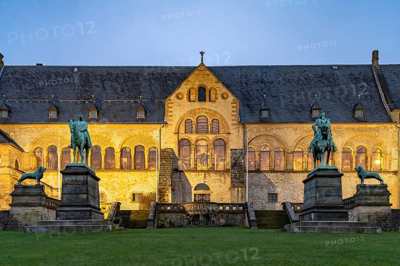 The Imperial House of the Romanesque Imperial Palace, UNESCO World Heritage Site in Goslar at dusk, Lower Saxony, Germany