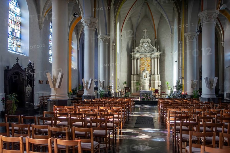 Altar of the 19th century Gothic Revival Saint Martin church in the village Beauraing, province of Namur, Wallonia, Belgium