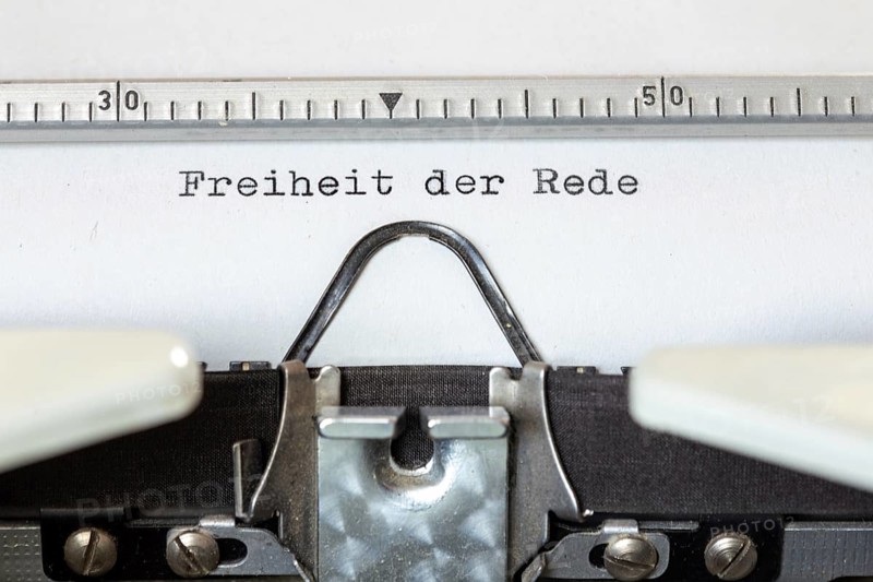 FREEDOM OF SPEECH, written with a typewriter