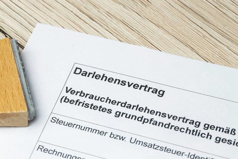 Close-up of a symbolic loan agreement