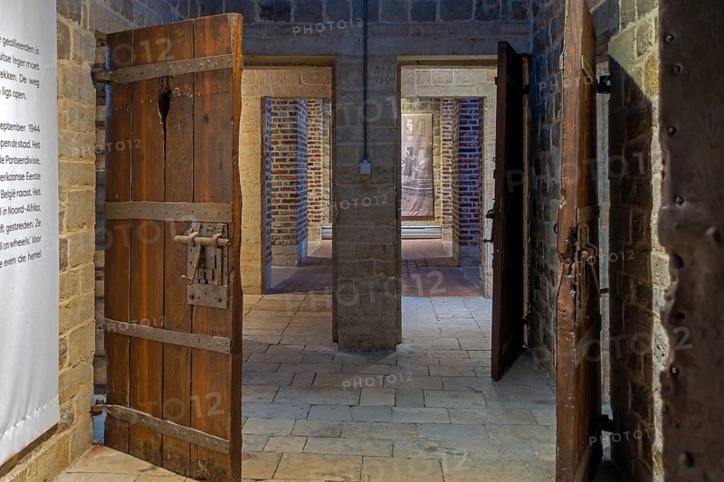 Old wooden cell doors in Het Toreke museum, former 19th century prison at the Grote Markt in the city Tienen, Tirlemont, Flemish Brabant, Belgium