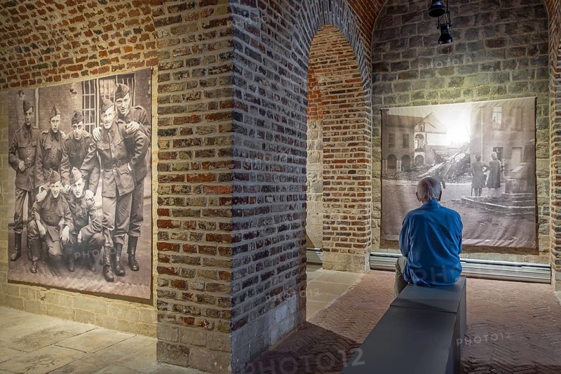 Vintage photos of WWII in Het Toreke museum, former 19th century prison at the Grote Markt in the city Tienen, Tirlemont, Flemish Brabant, Belgium. Model released