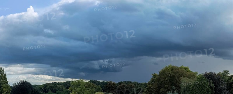 Gathering low pressure area with rain front dark stratus clouds Nimbostratus clouds, international