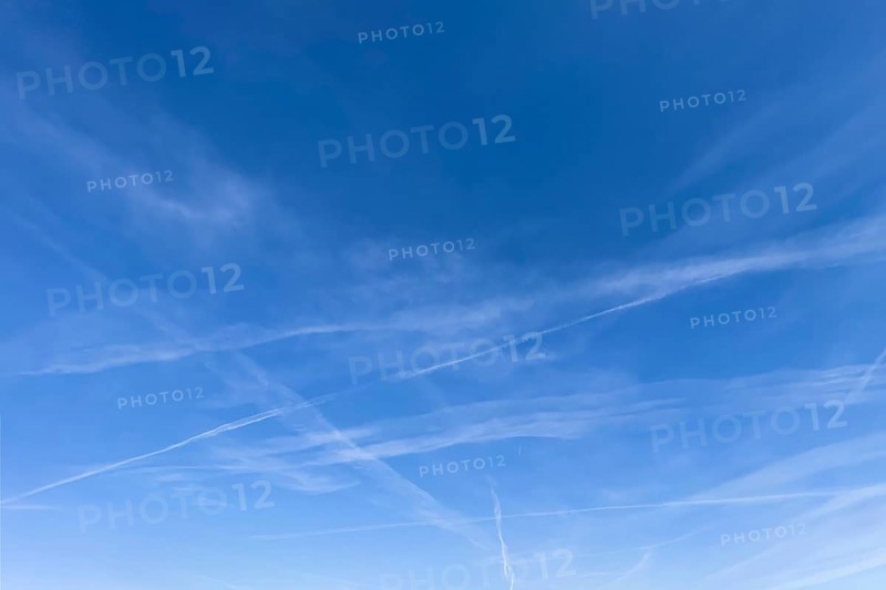 Cirrus clouds Cirrus clouds and contrails falsely called chemtrails under blue sky, international