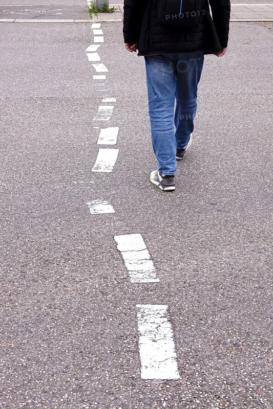 Displaced road markings, symbolic image of need for renovation, Germany