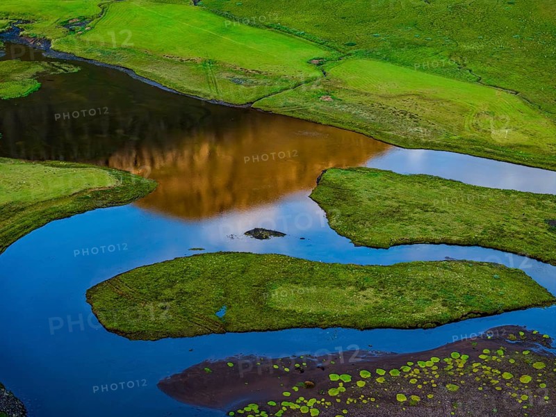 Morning light, river, river delta, river course, reflection, summer, aerial view, Stodvarfjördur, East Fjords, Iceland