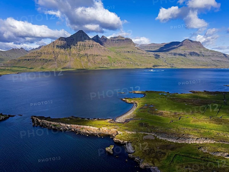 Mountains, morning light, fjord, coast, summer, aerial view, Berufjördur, behind it Teigarhorn, East Fjords, Iceland