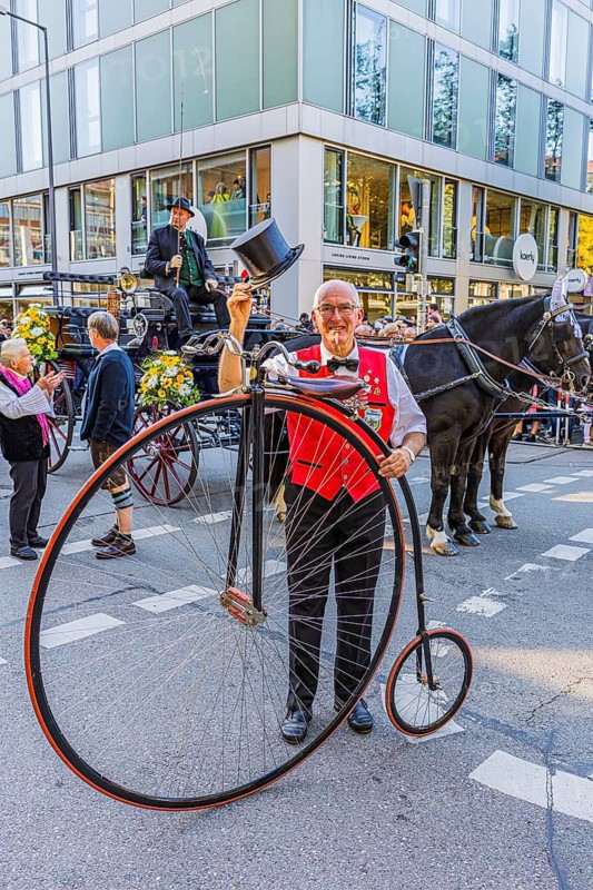 A penny-farthing rider with top hat, Oktoberfest, Munich, Upper Bavaria, Bavaria, Germany