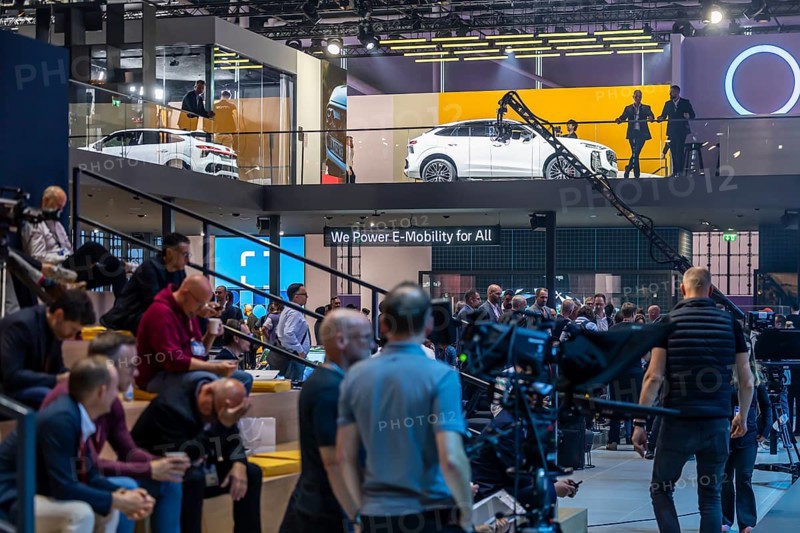Volkswagen exhibition stand. IAA MOBILITY in Munich. The motor show presents itself as a holistic mobility trade fair. But cars are still the centre of attention. Munich, Bavaria, Germany