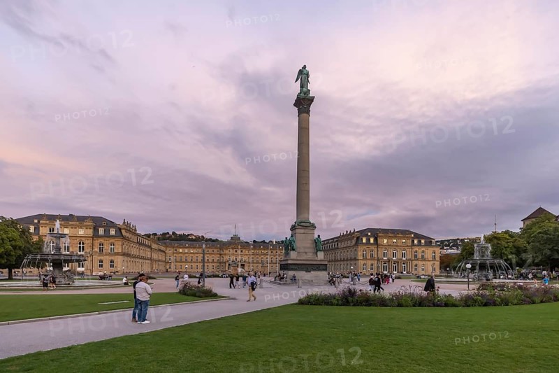 Evening atmosphere at Schlossplatz Stuttgart. View of the New Palace and Jubilee Column. Stuttgart, Baden-Württemberg, Germany