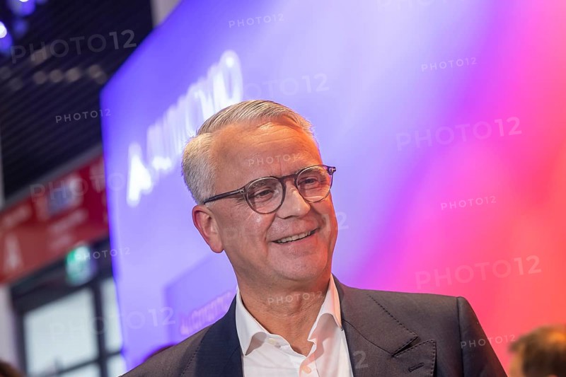 Philipp von Hirschheydt, CEO Aumovio. Exhibition stand of the company Aumovio. IAA MOBILITY in Munich. The motor show presents itself as a holistic mobility trade fair. Cars continue to take centre stage, however, and Chinese manufacturers are gaining ground. Munich, Bavaria, Germany