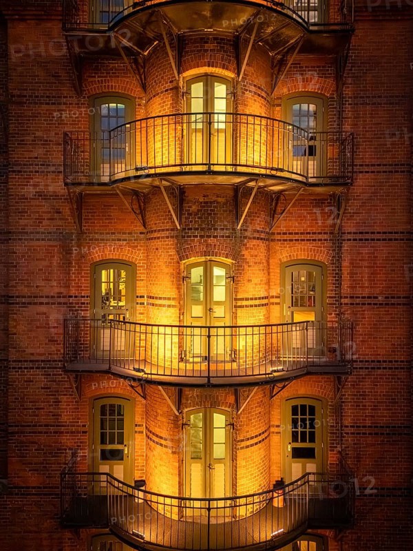 Hamburg warehouse district with evening lighting, Hamburg, Germany
