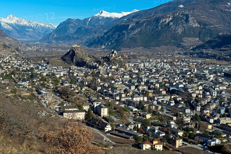 The town of Sion in the Rhone Valley with the two castles Tourbillon, left, and Valere, right, Sion, Valais, Switzerland