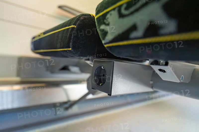Detail of a modern seat with socket in the interior of a vehicle, battery Electric train with green electricity, Siemens Mireo Plus B, Freudenstadt, Germany