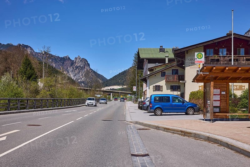 Bus stop Bischofswiesen centre, street, general architecture, vehicles, mountains, mountain landscape, trees, blue sky, cloudless, federal road 20, Bischofswiesen, district Berchtesgadener Land, Bavaria, Germany