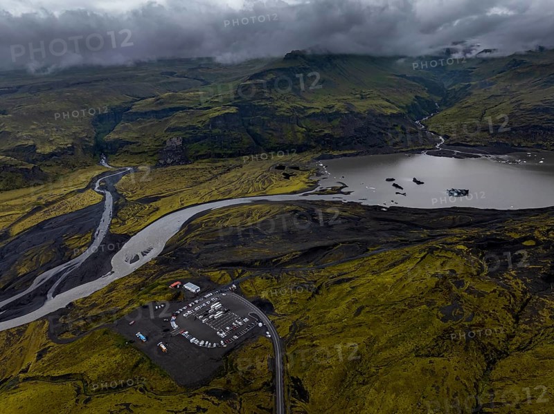 Lake, mountains, car park, car, mass tourism, overtourism, cloudy, rainy, summer, aerial view, Myrdalsjökull, Iceland