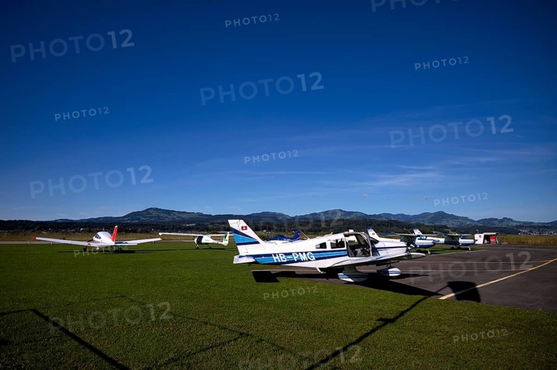 Pipistrel Velis Club on the right with aircraft registration HB-NPP stands next to Piper Archer II HB-PPY on the left and PA28 Archer II 180 HP HB-PMG, centre Wangen-Lachen airfield, LSPV, Canton Schwyz, Switzerland