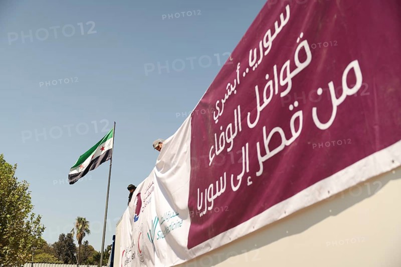 Relief workers unload boxes of medical aid provided by Qatar at Damascus International Airport, part of the humanitarian bridge supporting Syria's recovery and reconstruction after the fall of Bashar al-Assad, Damascus, Damascus, Syria