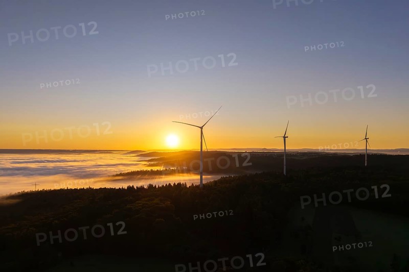 Three wind turbines towering in the morning landscape with fog, near Schorndorf, Rems-Murr-Kreis, Rems-Murr-Kreis, Baden-Württemberg, Germany