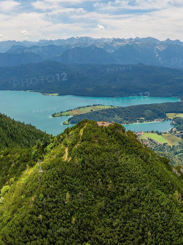 Sweeping views of lakes and mountains under a cloudy sky, Herzogstand summit, Walchensee, Schlehdorf, Germany