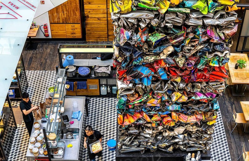Interior design, artwork made from compressed scrap cars, partially vacant Shopping Quartier 205 in Friedrichstraße and Mohrenstraße, Berlin, Germany