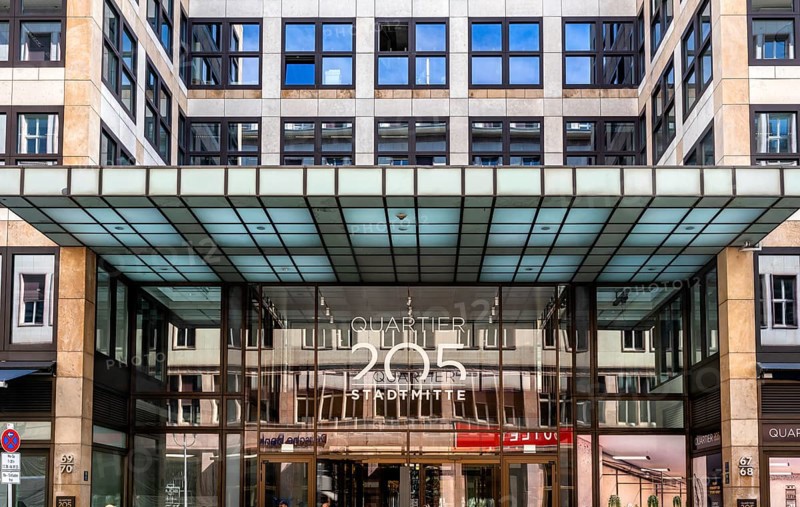 Main entrance to commercial property, partially vacant Shopping Quartier 205 on Friedrichstrasse and Mohrenstrasse, Berlin, Germany
