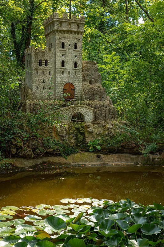 Water lily pond with bee castle in the spa gardens of Baden, Lower Austria, Austria