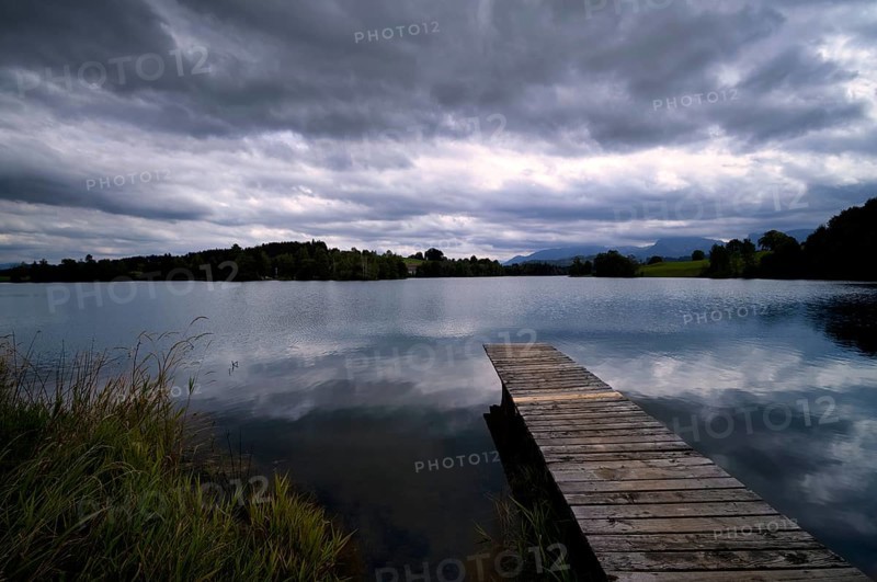 Bathing jetty, jetty, wooden jetty, jetty, leads into a lake, bathing lake, Schwaltenweiher near Seeg, Allgäu Alps, East Allgäu, Allgäu, Swabia, Bavaria, Germany
