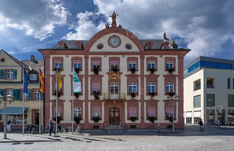 Town hall with golden coat of arms and lion figure, built in 1780, Hauptstrasse, Offenburg, Baden-Württemberg, Germany