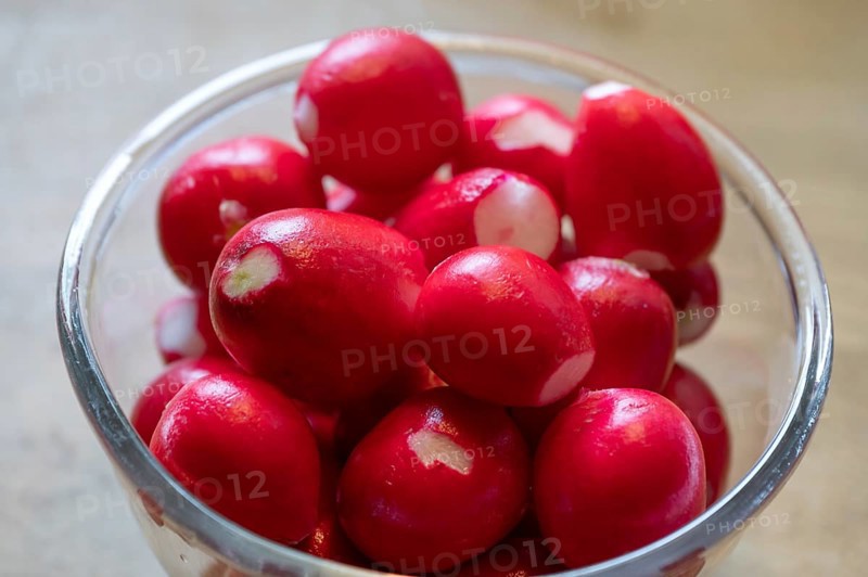 Fresh radishes in a glass bowl, Bavaria, Germany